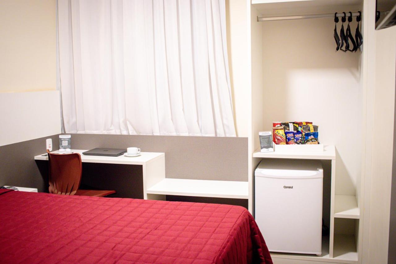 Hotel H2 Congonhas Exterior photo A typical room at a capsule hotel